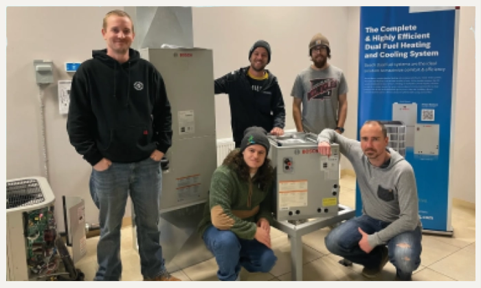 Group of workers smiling at the camera